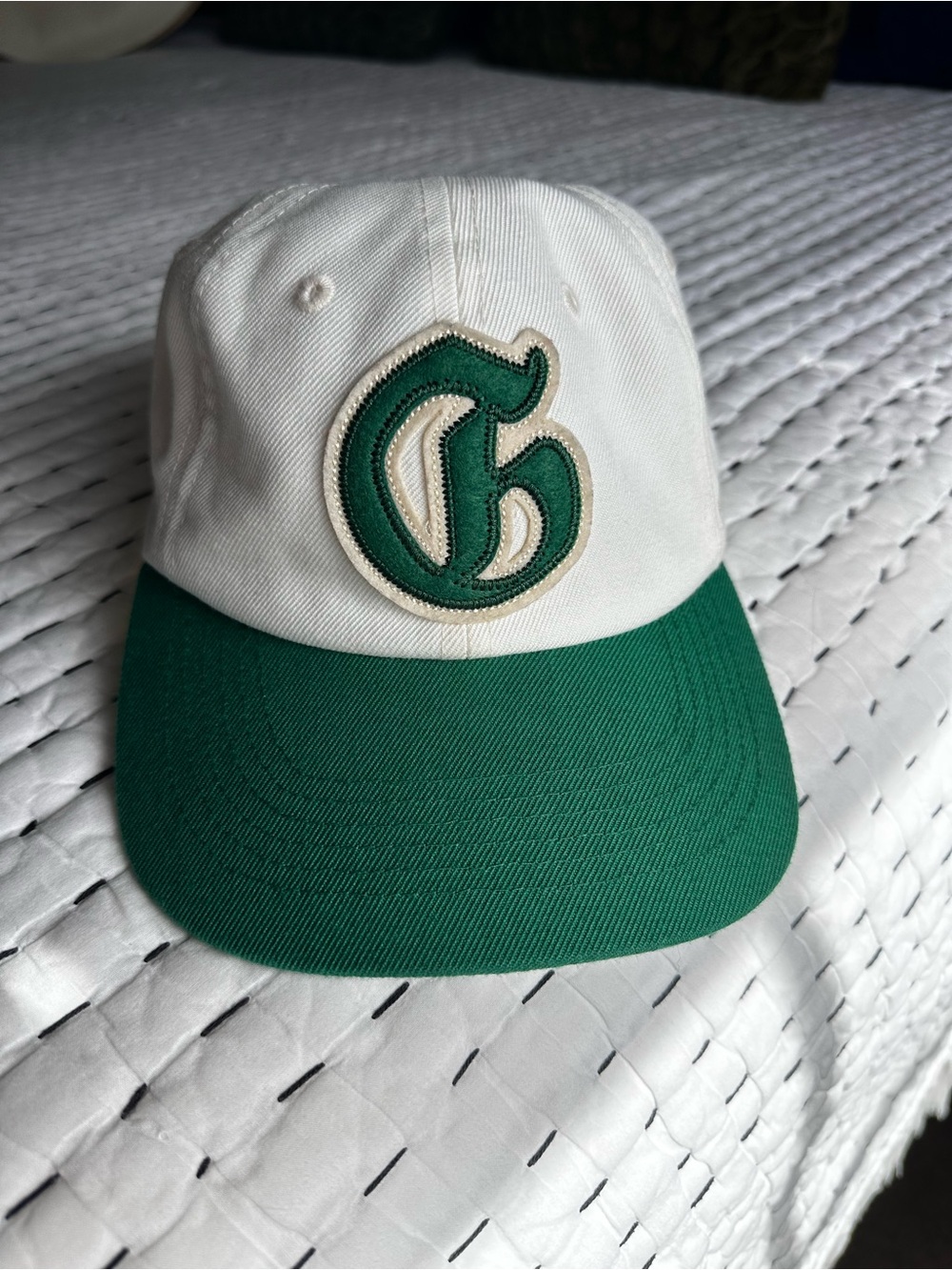 Two-Tone White and Green Baseball Cap with Embroidered G Patch